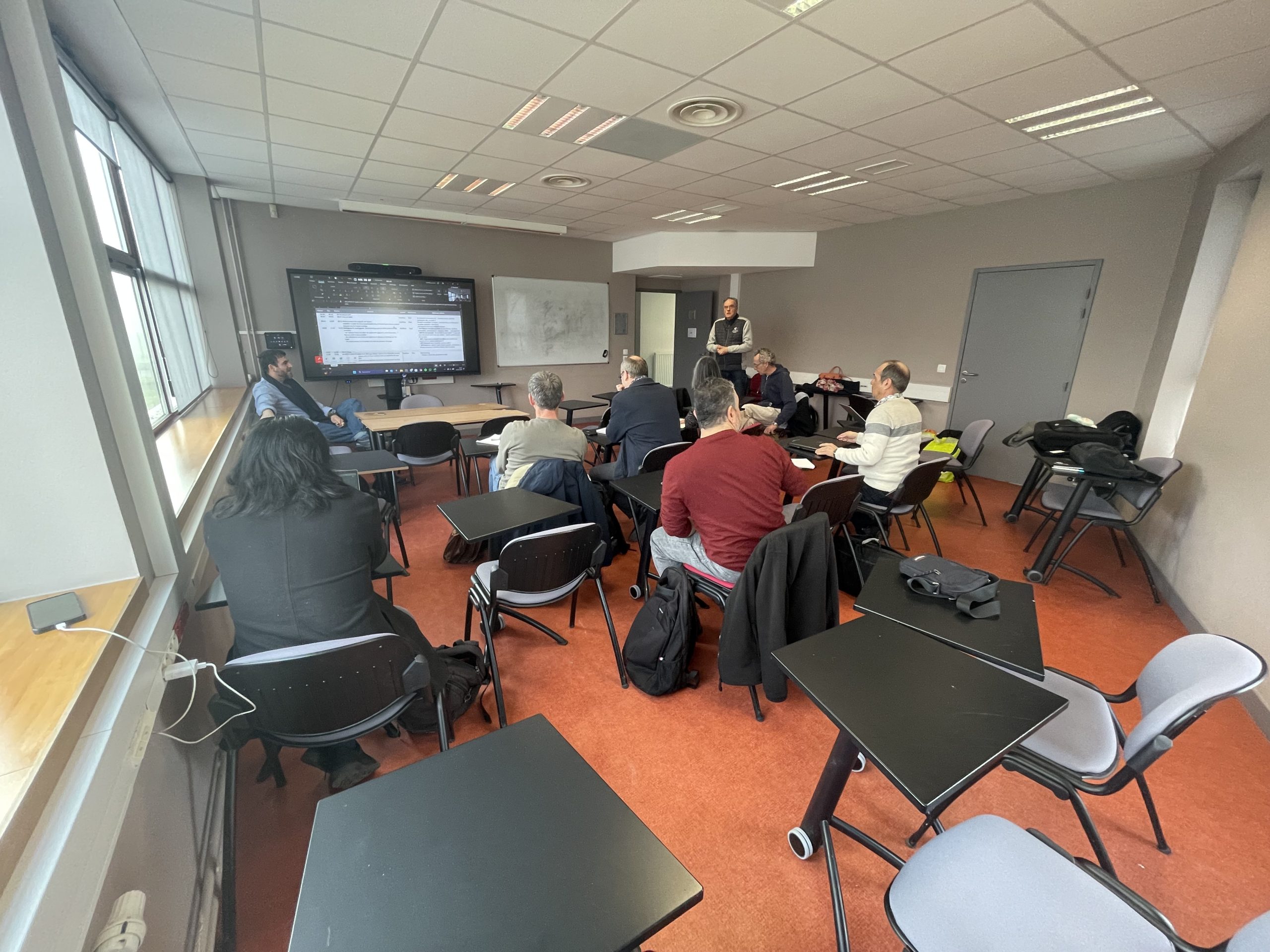Chercheurs collaborant lors d'un atelier thématique
